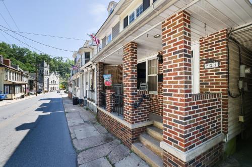 a brick building on the side of a street at Home on Broadway in Jim Thorpe in Jim Thorpe