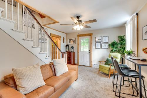 a living room with a couch and a table at Recently Renovated Harveys Lake Retreat with Dock! in Harveys Lake