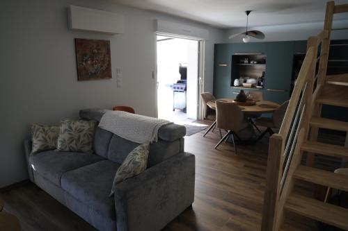 Χώρος καθιστικού στο Logement en lisière de forêt