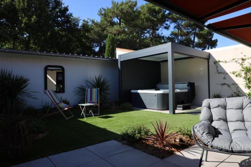 Κήπος έξω από το Logement en lisière de forêt