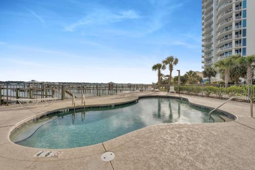 a small swimming pool in the middle of a building at Little Lagoon Beach House by The Madison Liv Collection in Gulf Shores
