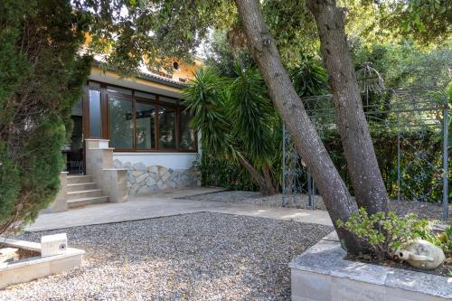 Giardino di Residence Il Boschetto - Villa Con Piscina