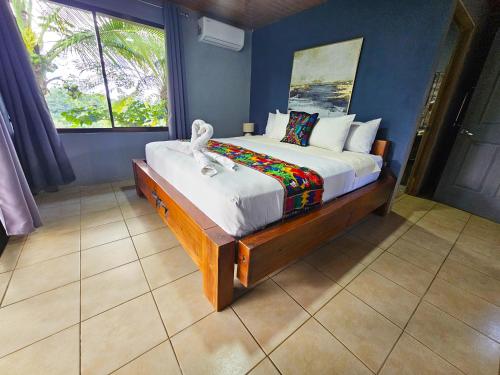 Ένα ή περισσότερα κρεβάτια σε δωμάτιο στο Famillies Getaway - 3Bed & 2Bath in Arenal Volcano