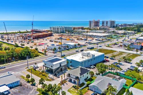 an aerial view of a city with the ocean at Wave Haven Suites - 4BR-5BA Luxury - 2 Suites - Walk to Beach - Views in Cocoa Beach