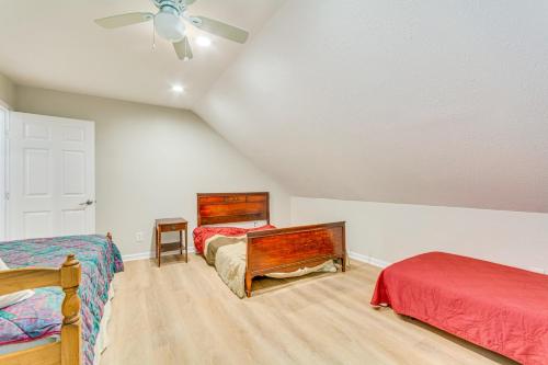 a bedroom with two beds and a ceiling fan at Lakefront Retreat with Multi-Level Deck and Dock! in Alexander
