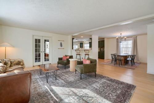 a living room with a couch and a table at Buckingham Woods I Hocking Hills in Logan