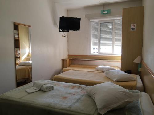 City Hotelにあるベッド