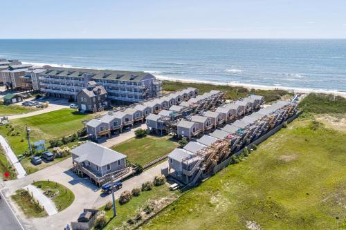 an aerial view of a resort next to the ocean at Southern Comfort Cabana #25ODC-H in Hatteras