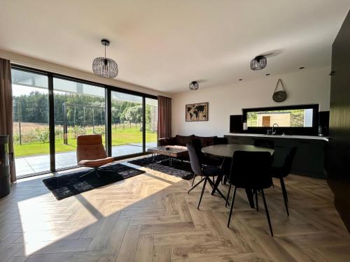 Χώρος καθιστικού στο Domek wypoczynkowy Wiec - Sauna & Balia