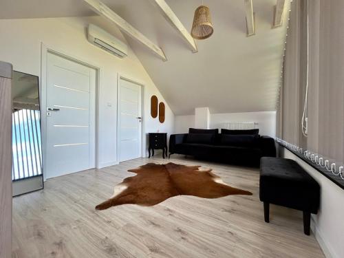 Χώρος καθιστικού στο Domek wypoczynkowy Wiec - Sauna & Balia