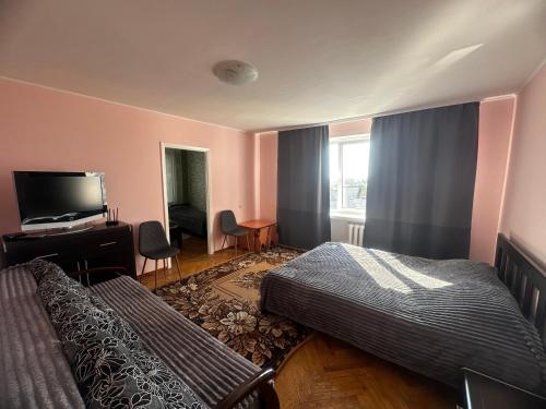 4-км в центрі містаにあるベッド