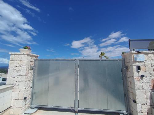 a metal gate on top of a roof at Villa Nunzia in Ostuni