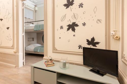 Postel nebo postele na pokoji v ubytování Serenata Hotel & Hostel Coimbra