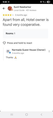 a screenshot of the safari browser on a cell phone at Narmada Guest House in Indore