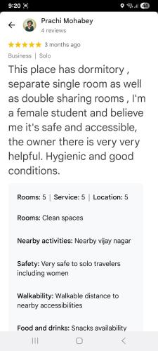 a screenshot of a cell phone of a text message at Narmada Guest House in Indore