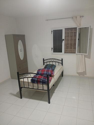 Ein Bett oder Betten in einem Zimmer der Unterkunft Transit