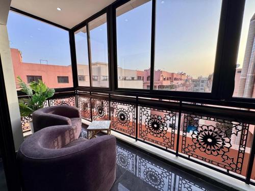 Khu vực ghế ngồi tại Chic Duplex Central 3 Suites et Wi-Fi