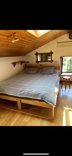 Postel nebo postele na pokoji v ubytování La Maison du Bonheur