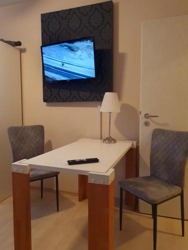 CityPark Hotelにあるテレビまたはエンターテインメントセンター