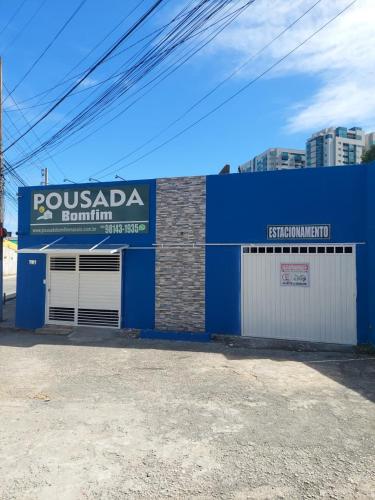 a blue building with at Pousada Bomfim in Maceió