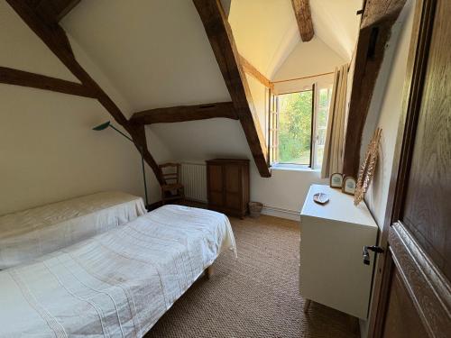 Postel nebo postele na pokoji v ubytování Maison familiale, nature et sologne