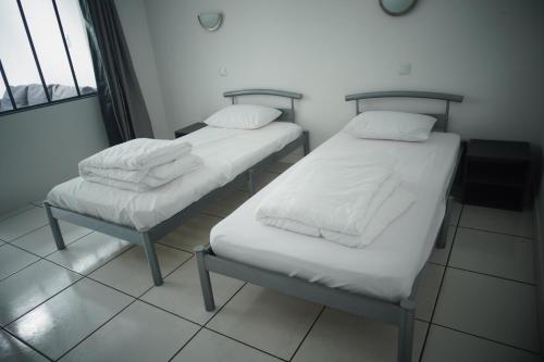 Katil atau katil-katil dalam bilik di Appartement T2 Noisy Le Grand