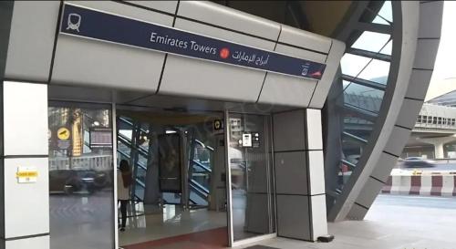 an entrance to an airport with a sign on it at Affordable Luxury Capsule Bed in Downtown Dubai Near Metro in Dubai