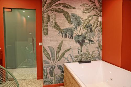 a bathroom with a shower and a bath tub at Casa Barlotti Residenza di Campagna in Paestum