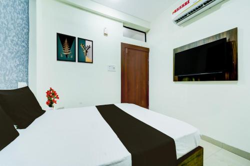 Super Collection O Hotel SP14にあるテレビまたはエンターテインメントセンター