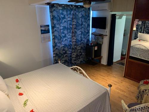 Un ou plusieurs lits dans un hébergement de l'établissement "A Tomo Mai Homestay" Airport, Free WiFi, Breakfast optional
