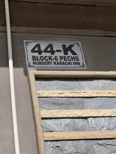a sign for blocks and pegs sqor sqor sqor sqor sqor sqor at Karachi Inn in Karachi