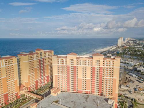 an aerial view of a hotel and the ocean at Oceanview 3BR Near Pier Park, Pool and Hot Tub in Panama City Beach