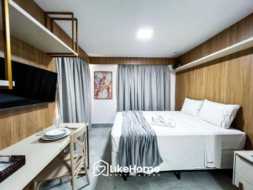 Ένα ή περισσότερα κρεβάτια σε δωμάτιο στο Legacy Suítes - LikeHome Hospedagens