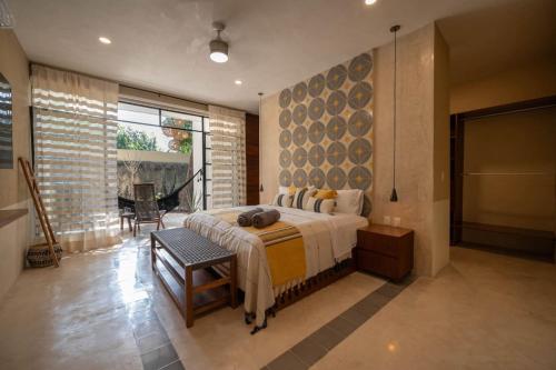 Ένα ή περισσότερα κρεβάτια σε δωμάτιο στο Luxury Heaven in Merida Poolside Bliss in La Ermita