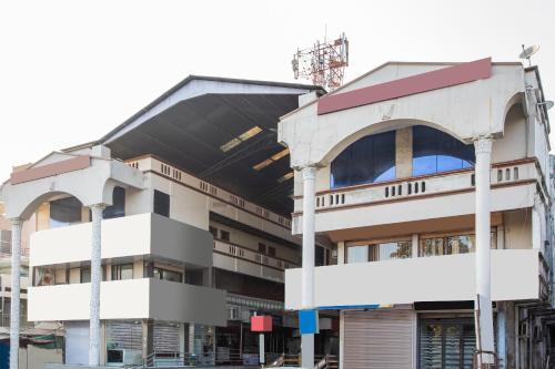a building under construction in a city at Super Hotel O Santushti in Dewās