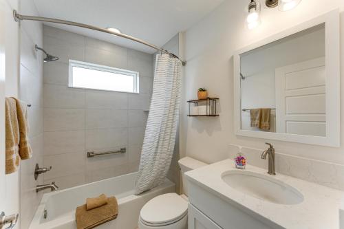 a white bathroom with a sink and a toilet at New Designer Home in The Villages Shady Brook in Wildwood