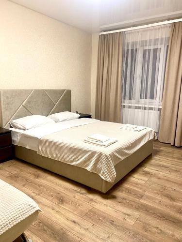 Кровать или кровати в номере Апартаменти ПортСіті, Автостанція,закрита парковка
