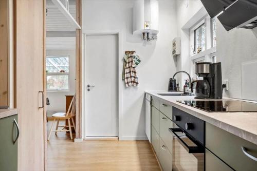 a kitchen with a sink and a counter top at 873-Thisted-Blamunkevej-67 in Thisted