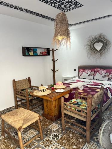 Una cama o camas en una habitación de Dar Doukkala Oualidia