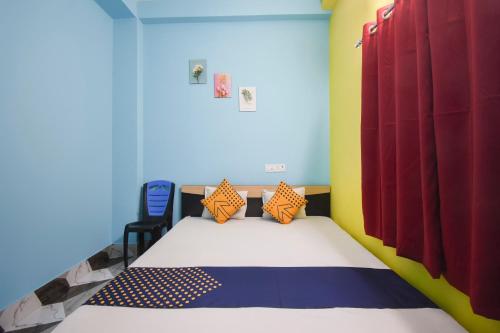 Postel nebo postele na pokoji v ubytování Hotel O Aagman Guest House