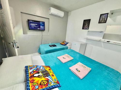 Un ou plusieurs lits dans un hébergement de l'établissement Pousada Açude Velho II