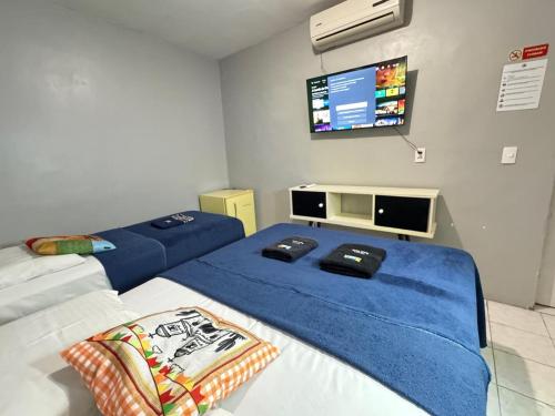 En eller flere senge i et værelse på Pousada Açude Velho II