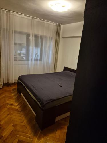Ένα ή περισσότερα κρεβάτια σε δωμάτιο στο ultracentral