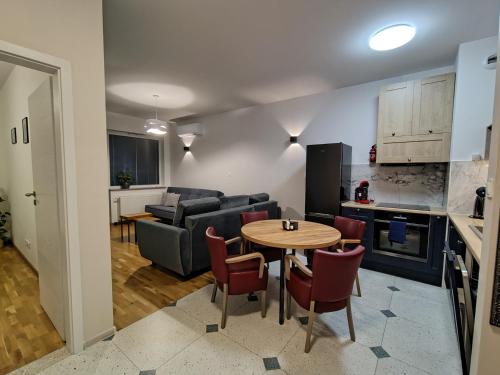 Η κουζίνα ή μικρή κουζίνα στο Buko apartamenty