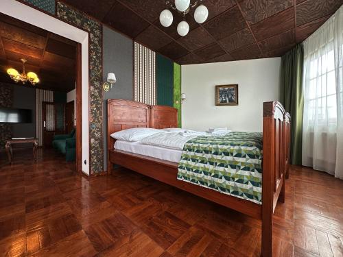 Postel nebo postele na pokoji v ubytování Hotel Velká Klajdovka