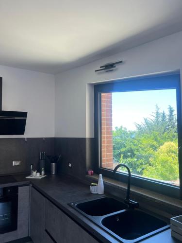 Una cocina o zona de cocina en In My Place