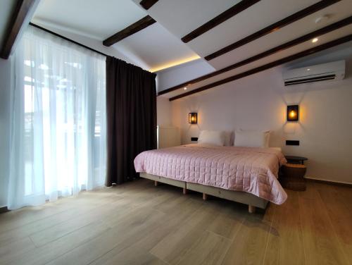 Meteora Gold and Glass Loft