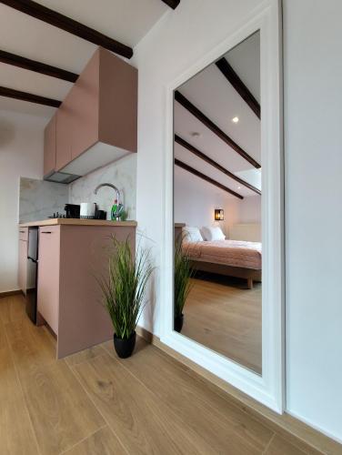 Meteora Gold and Glass Loft