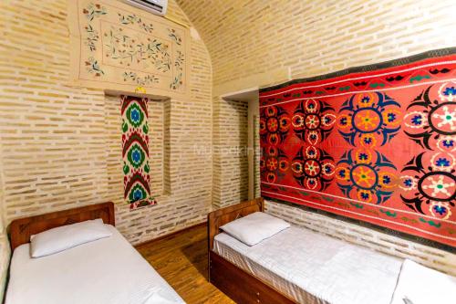 Letto o letti in una camera di Ohun karavan saray historical 18th century hotel