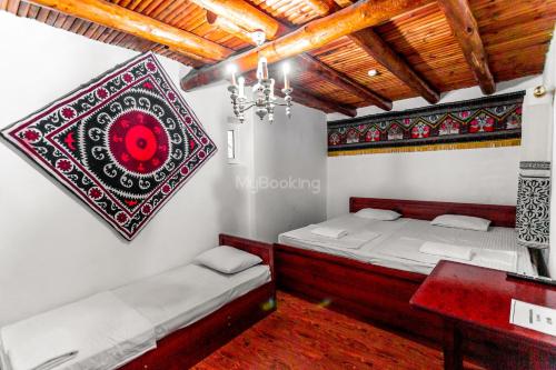 Letto o letti in una camera di Ohun karavan saray historical 18th century hotel